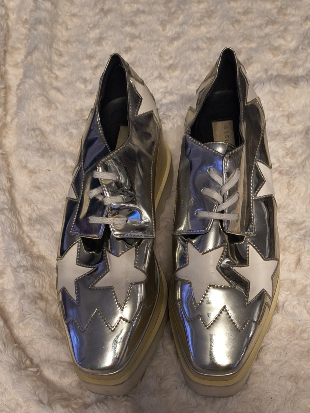 Stella McCartney Metallic Silver Platform Sneakers with White Star Appliqué